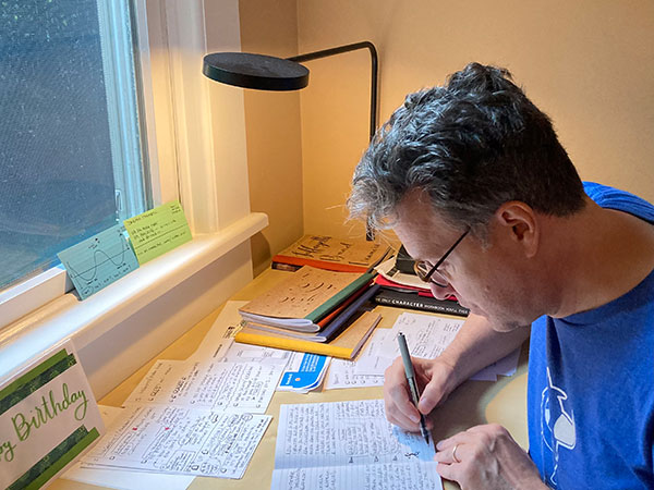 Mark Siegel writing in longhand in the early mornings