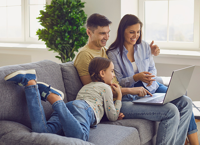 Family reading Breakfast Serials on their tablet