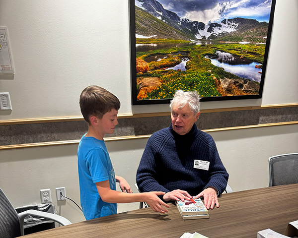 The time spent talking with students as I sign their books is meaningful to me. They're my readers!